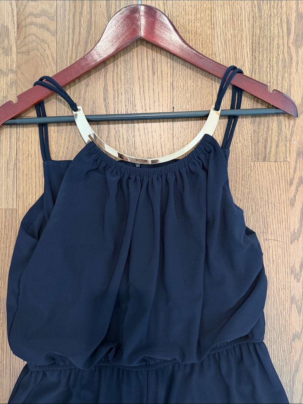 Navy Sleeveless Romper with Gold Neck Accent